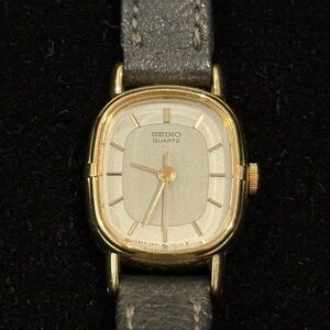 Seiko Gold-Tone Case Silver Dial Watch with Gray Strap